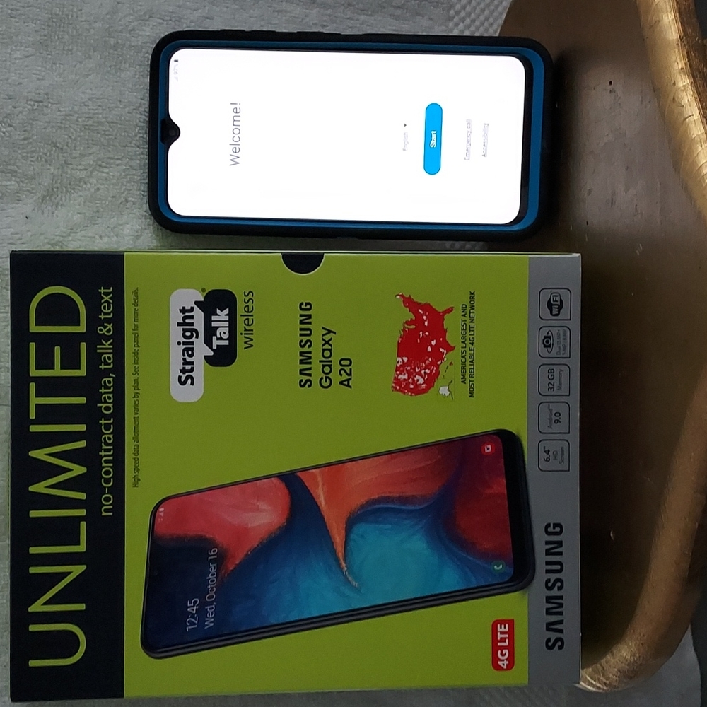 A strait talk wireless samsung galaxy  A 20 4G  32 GB memory cell phone